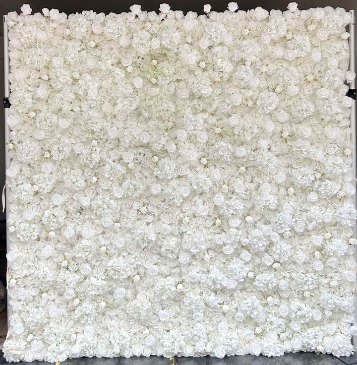 Elegant white flower wall backdrop with lush greenery for weddings