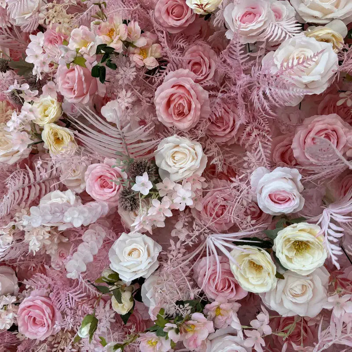 Lush pink floral backdrop, featuring detailed roses and peonies for elegant events.
