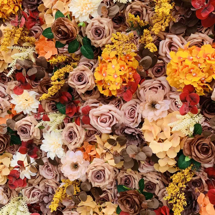 Close-up of artificial roses and dried florals in earthy shades on flower wall.