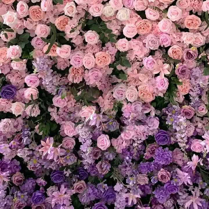 Close-up view of pastel lilac and rose floral backdrop for parties and celebrations.