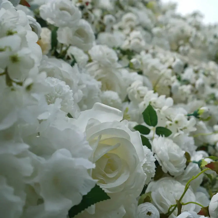 Angled macro shot of layered white flowers in wall arrangement