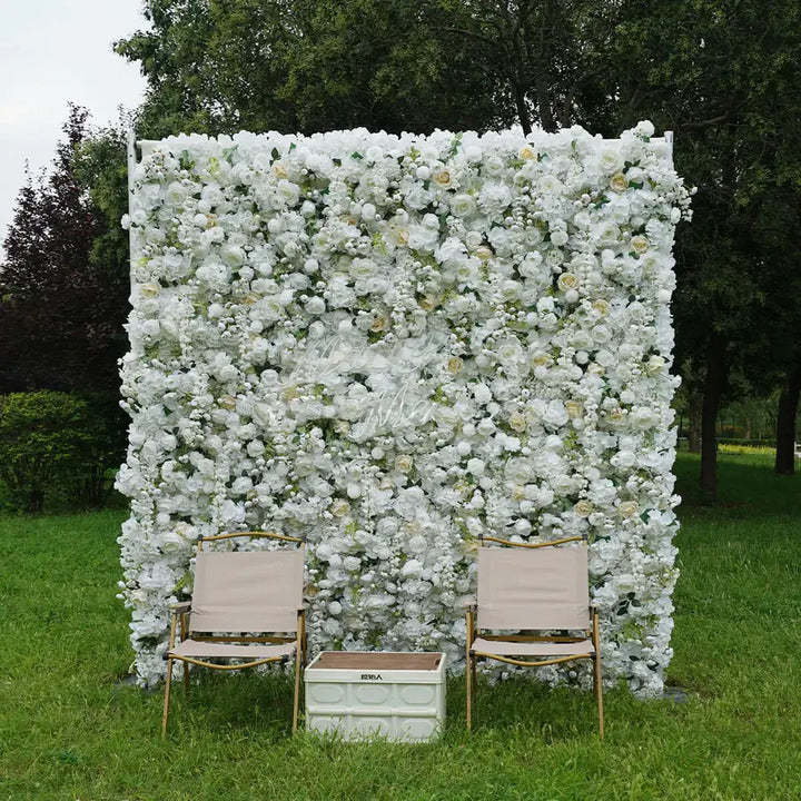 White floral wall backdrop behind modern indoor lounge setup
