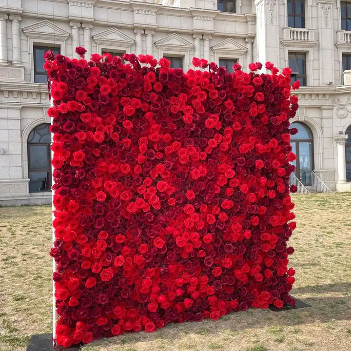 Luxurious deep red rose floral wall, perfect for romantic weddings and upscale events.