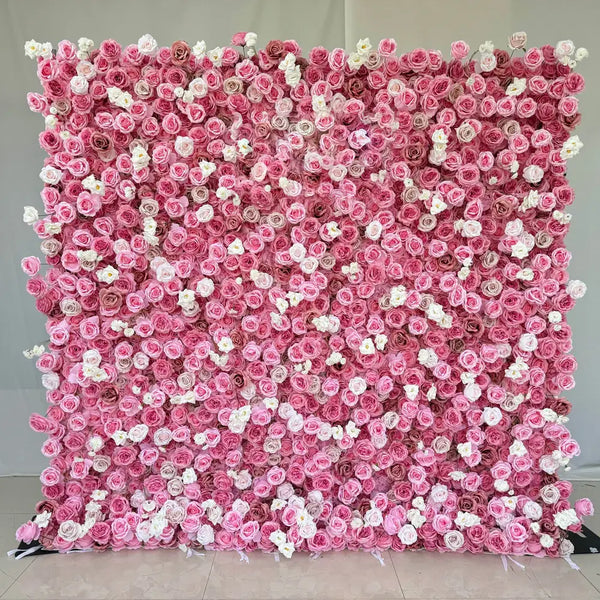 Full view of a blush pink flower wall backdrop with white and cream accents.