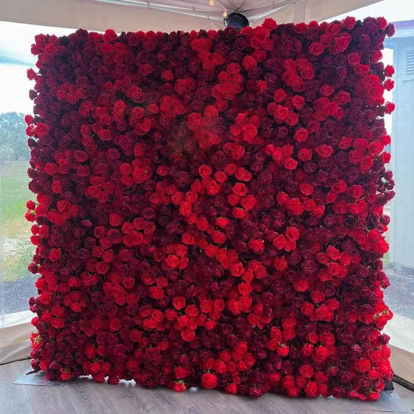 Luxurious deep red rose floral wall, perfect for romantic weddings and upscale events.