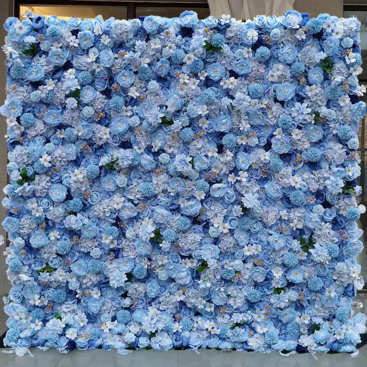 Light blue flower wall backdrop with layered artificial blooms