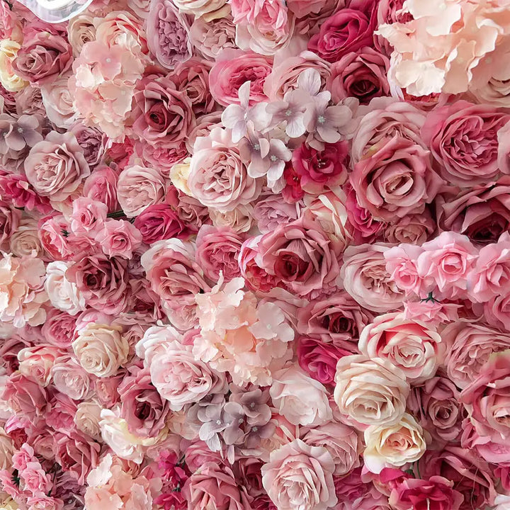 Close-up of layered pink roses and blush hydrangeas with soft textures