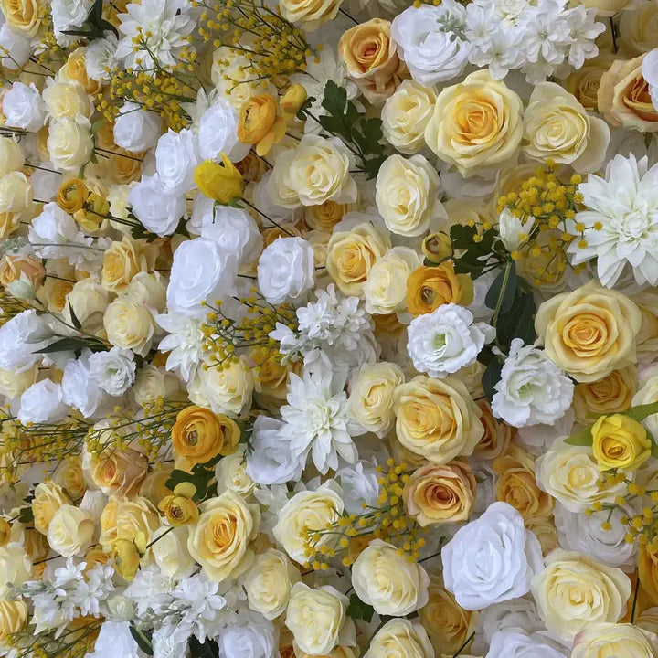 Elegant flower wall for weddings with a blend of roses in soft hues.