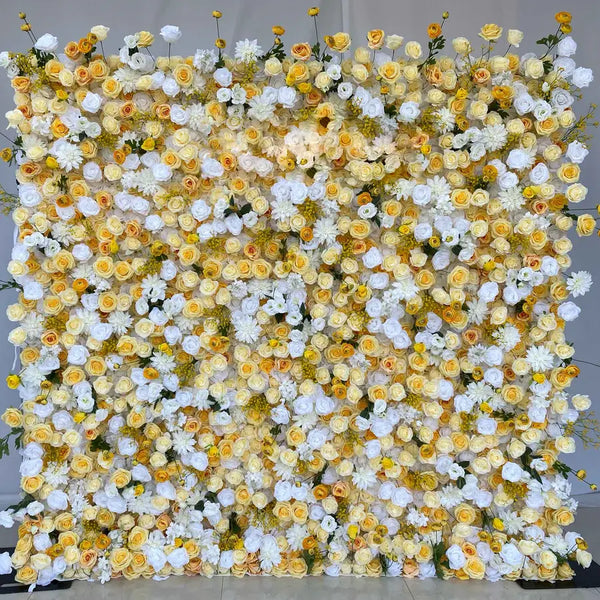 Close-up of yellow and white roses on a luxurious flower wall backdrop.