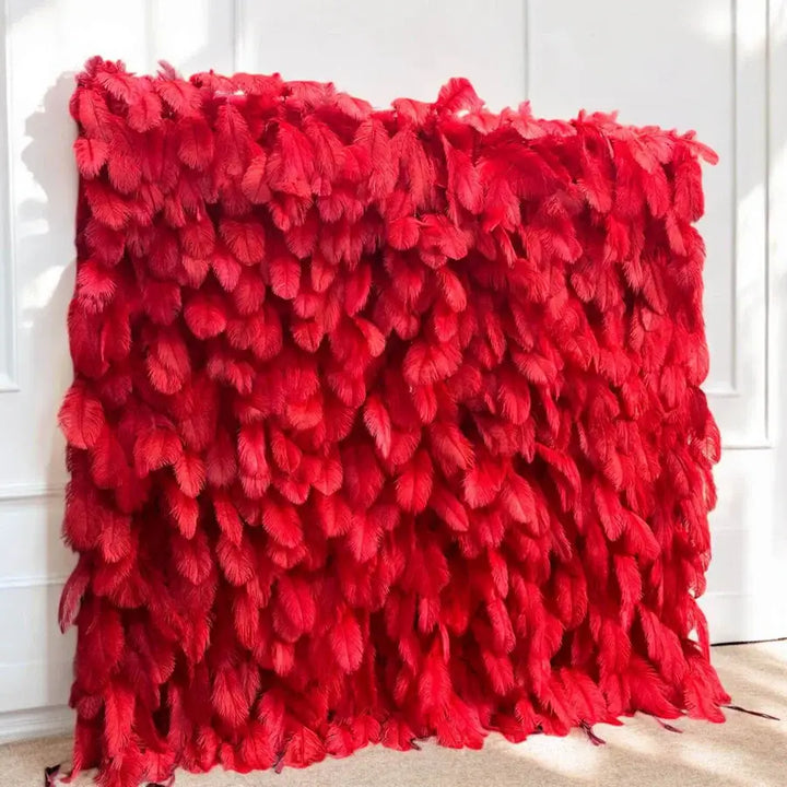 Side view of the Crimson Plume flower wall showing feather texture and dimension