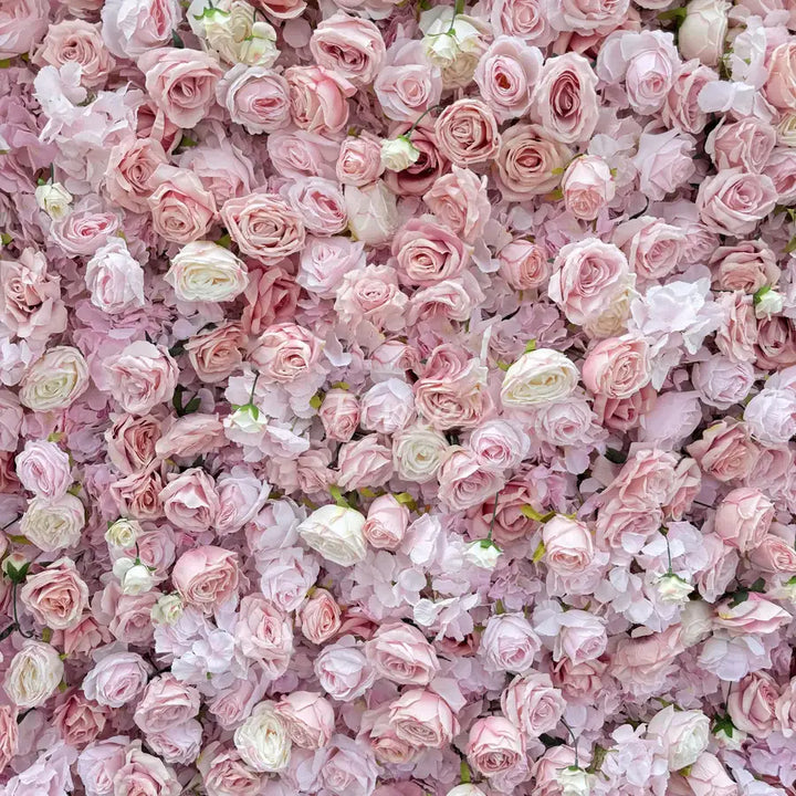 Elegant floral wall backdrop featuring pastel roses for special occasions.