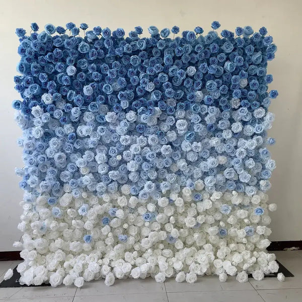 Elegant blue to white gradient rose flower wall, ideal for luxurious wedding settings.