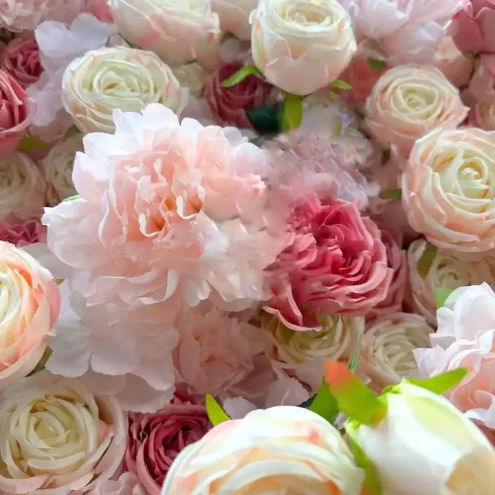 Elegant floral wall backdrop with a delicate mix of pink and white roses for upscale events.