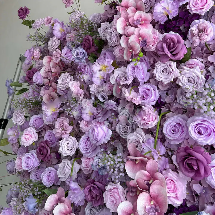 Luxurious purple and pink flower wall, perfect for creating a stunning visual at events.