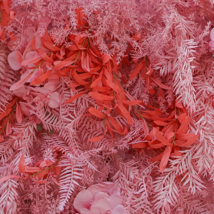 Side view of a pink floral backdrop set up in a garden, enhancing the event's aesthetic.