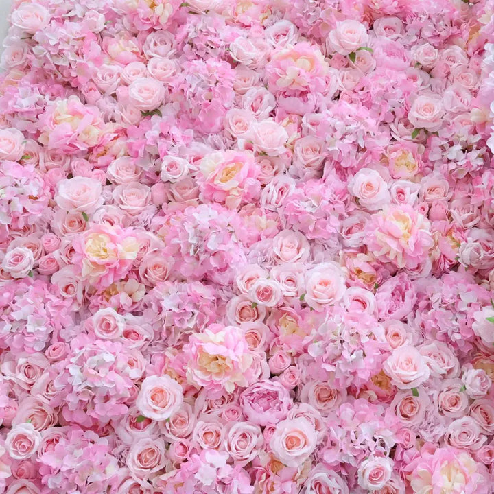 Close-up of blush peonies and pastel roses in decorative flower wall