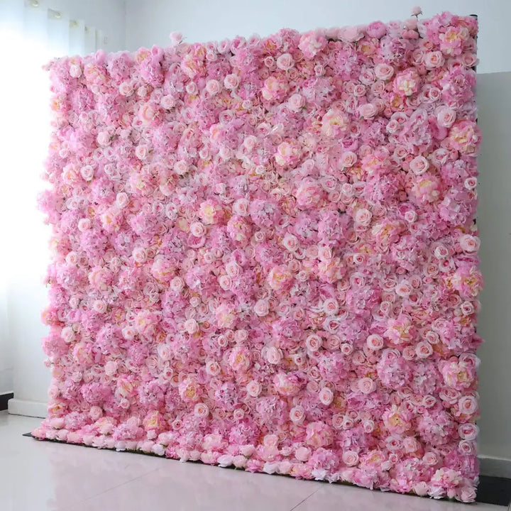 Floral wall backdrop in shades of pink for weddings and parties