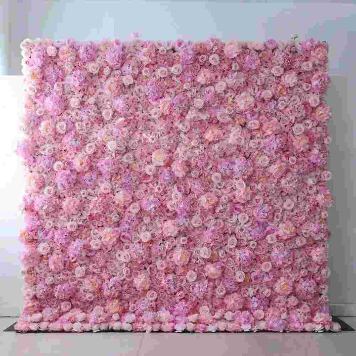 Soft pink flower wall filled with roses and peonies for elegant events