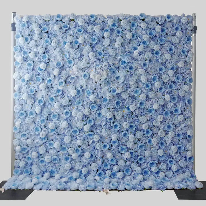 Blue flower backdrop behind modern white chair and table setup