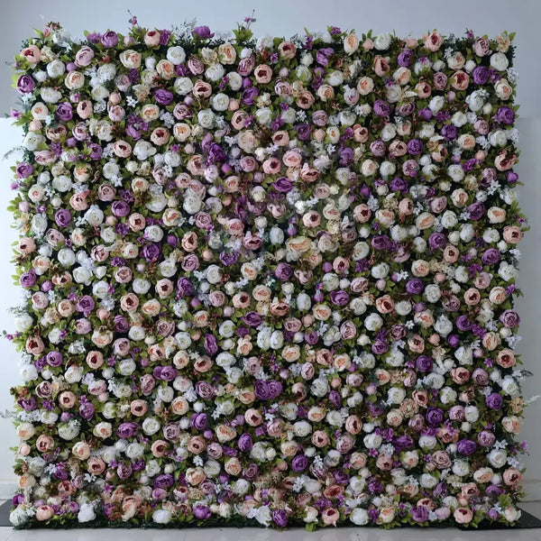 Purple and blush flower wall backdrop with lush roses and greenery