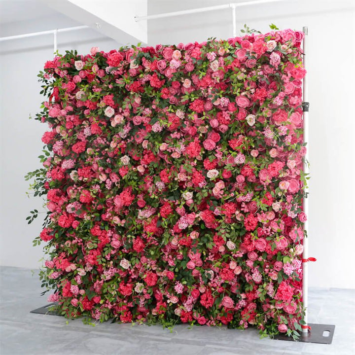 Side angle of decorative flower wall showcasing pink tones and vine accents
