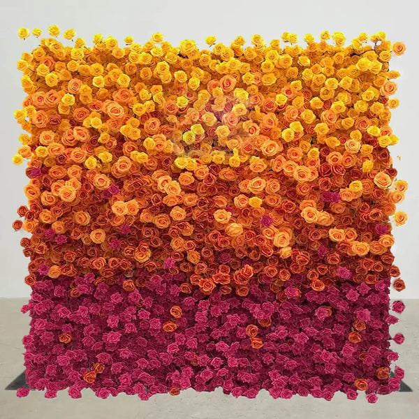 Gradient rose flower wall in yellow, orange, and pink for party décor