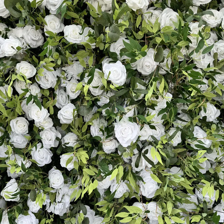 Close-up of dense white roses mixed with green foliage