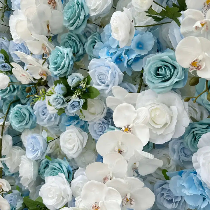 Decorative flower wall featuring pastel roses and foliage
