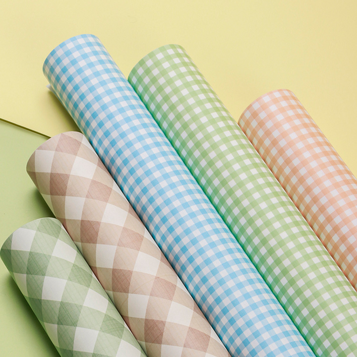 Pink gingham wrapping paper for gifts and flower bouquets.