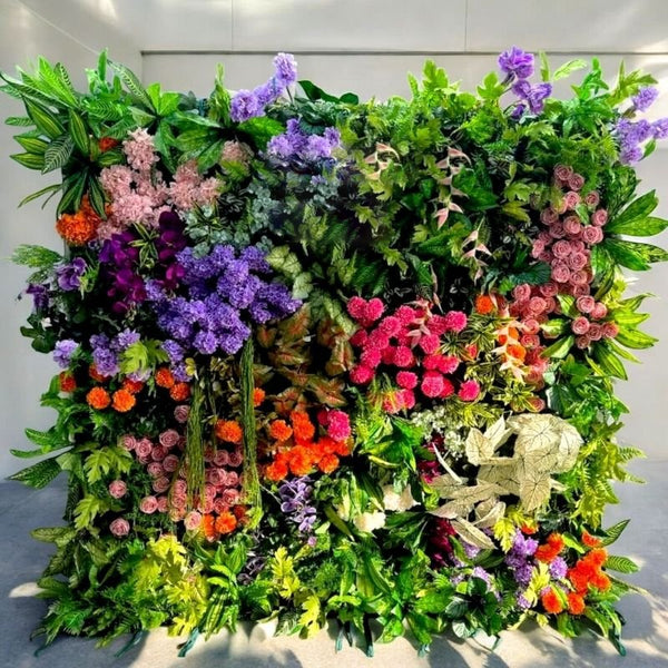 Vibrant garden flower wall backdrop with a colorful array of blooms perfect for event decor.
