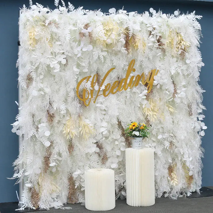 Detailed view of the decorative flower wall with soft golden accents.