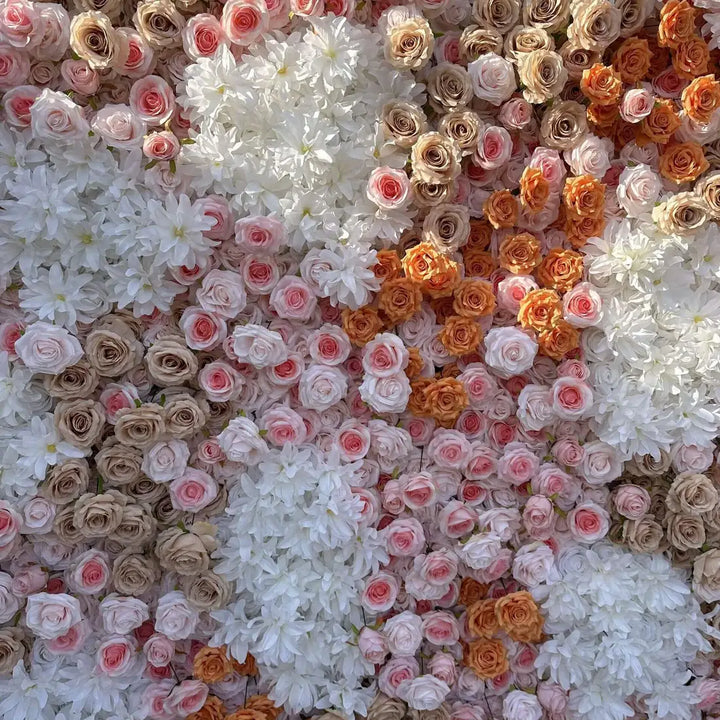 Close-up of blush and cream roses on a luxurious flower wall backdrop.
