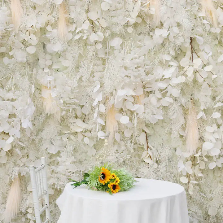 Close-up of decorative flower wall with delicate white florals and beige accents.