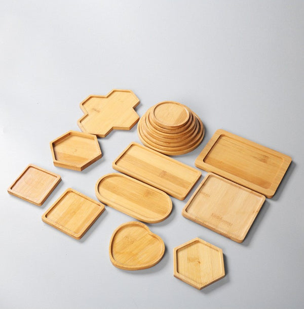 Assorted bamboo coasters and placemats in various shapes and sizes