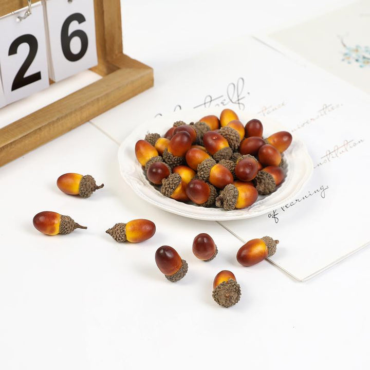 100pcs Artificial Mini Acorns for Crafts is a perfect addition to your floral supplies collection.