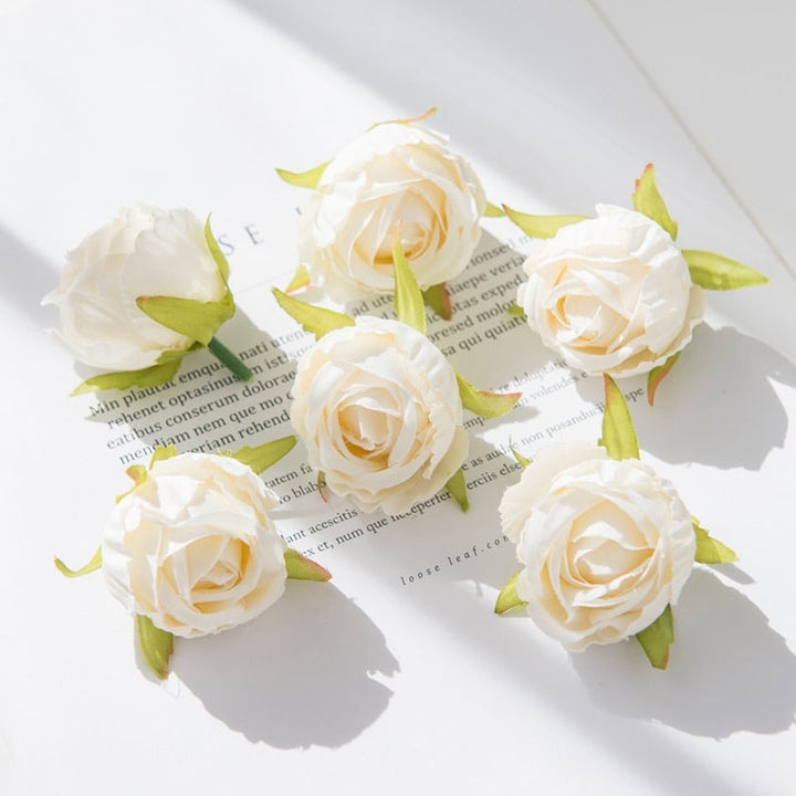 10Pcs Silk Rose Buds Flower Head Artificial Flowers is a perfect addition to your floral supplies collection.