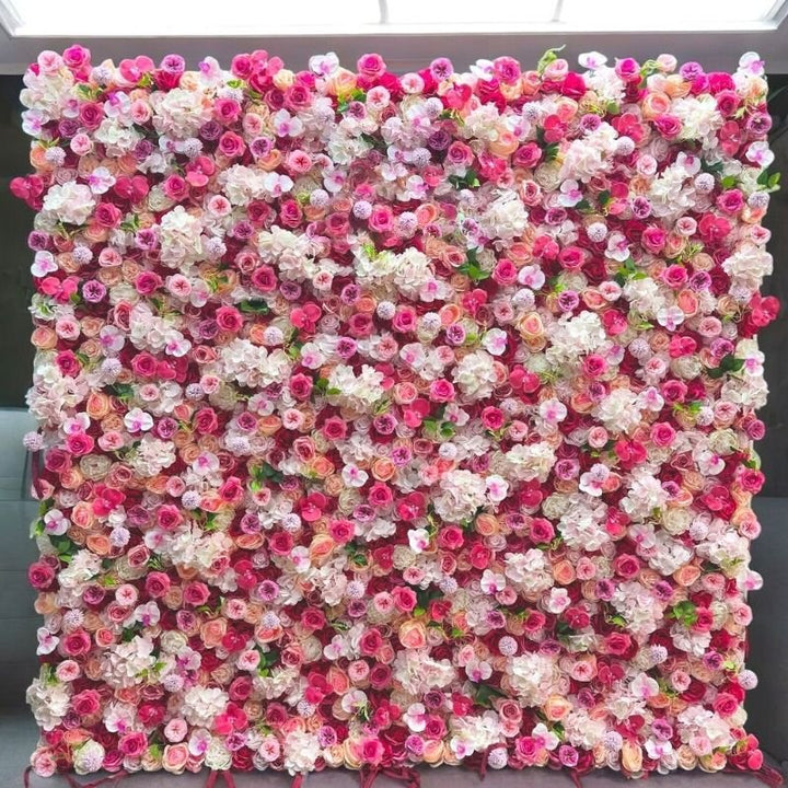 Close-up view of pink and white floral wall backdrop with roses and peonies for elegant event decoration.