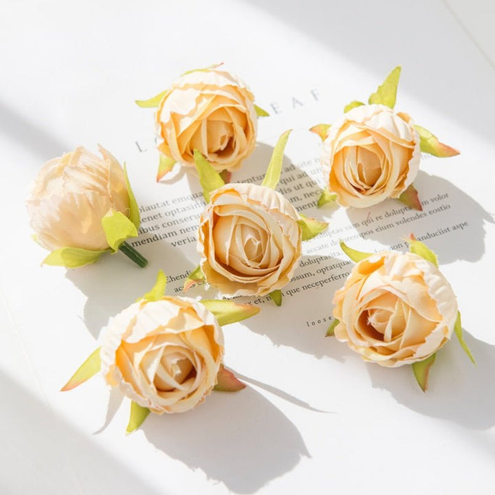 10Pcs Silk Rose Buds Flower Head Artificial Flowers is a perfect addition to your floral supply collection.