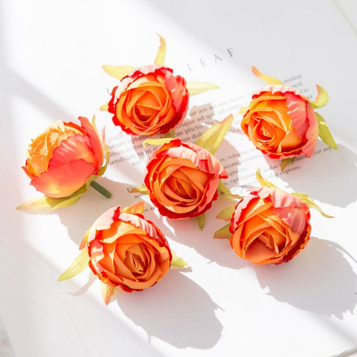 10Pcs Silk Rose Buds Flower Head Artificial Flowers is a perfect addition to your floral supply collection.