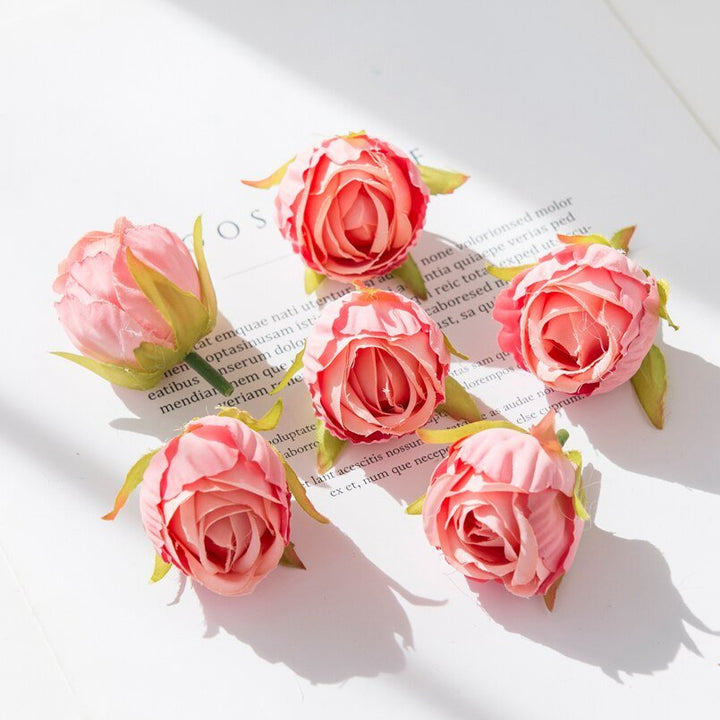 10Pcs Silk Rose Buds Flower Head Artificial Flowers is a perfect addition to your florist supply collection.