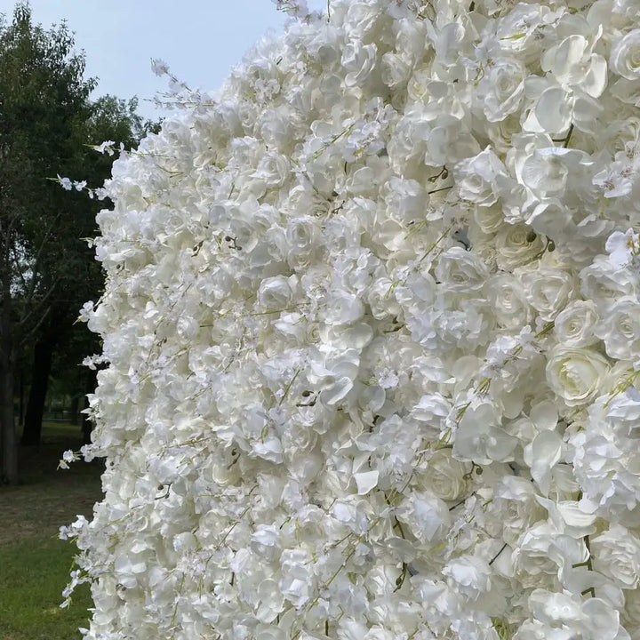 Side view close-up of white floral wall backdrop showing petal textures.