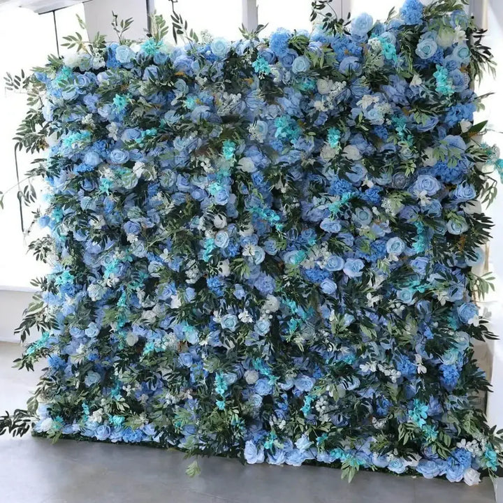 Elegant floral wall backdrop with blue roses and greenery perfect for events.
