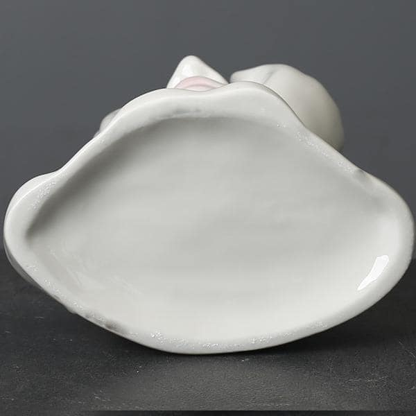 Modern art-inspired white ceramic portrait vase