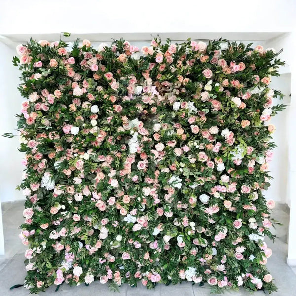 Elegant green and blush flower wall backdrop filled with roses and white florals.