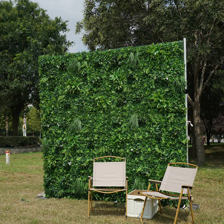 Greenery flower wall backdrop perfect for weddings and celebrations.