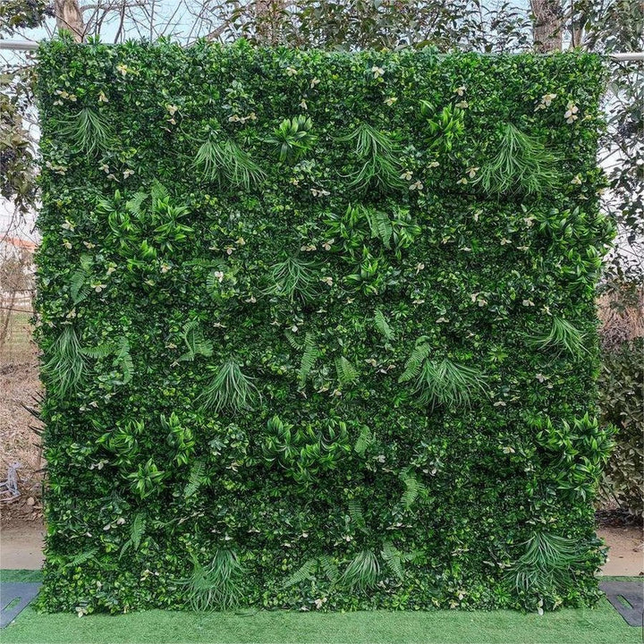 Lush greenery flower wall backdrop for wedding and event decoration.