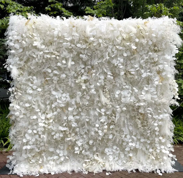 Full ivory flower wall with pampas grass and cascading eucalyptus.