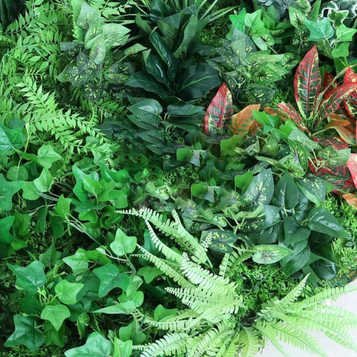 Detailed close-up of jungle-inspired floral backdrop with diverse plant species for an exotic touch.