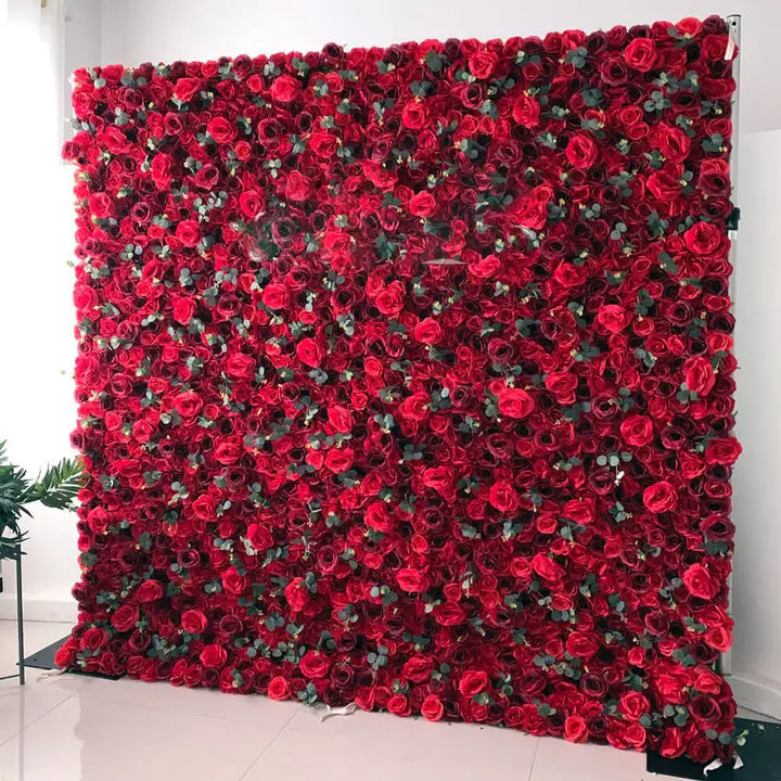 Close-up of decorative flower wall featuring velvety red roses.