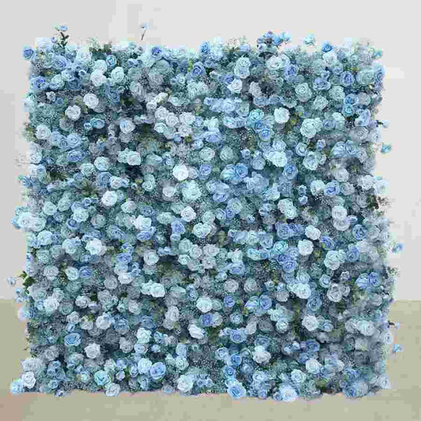 Full view of soft blue and white flower wall backdrop with lush roses
